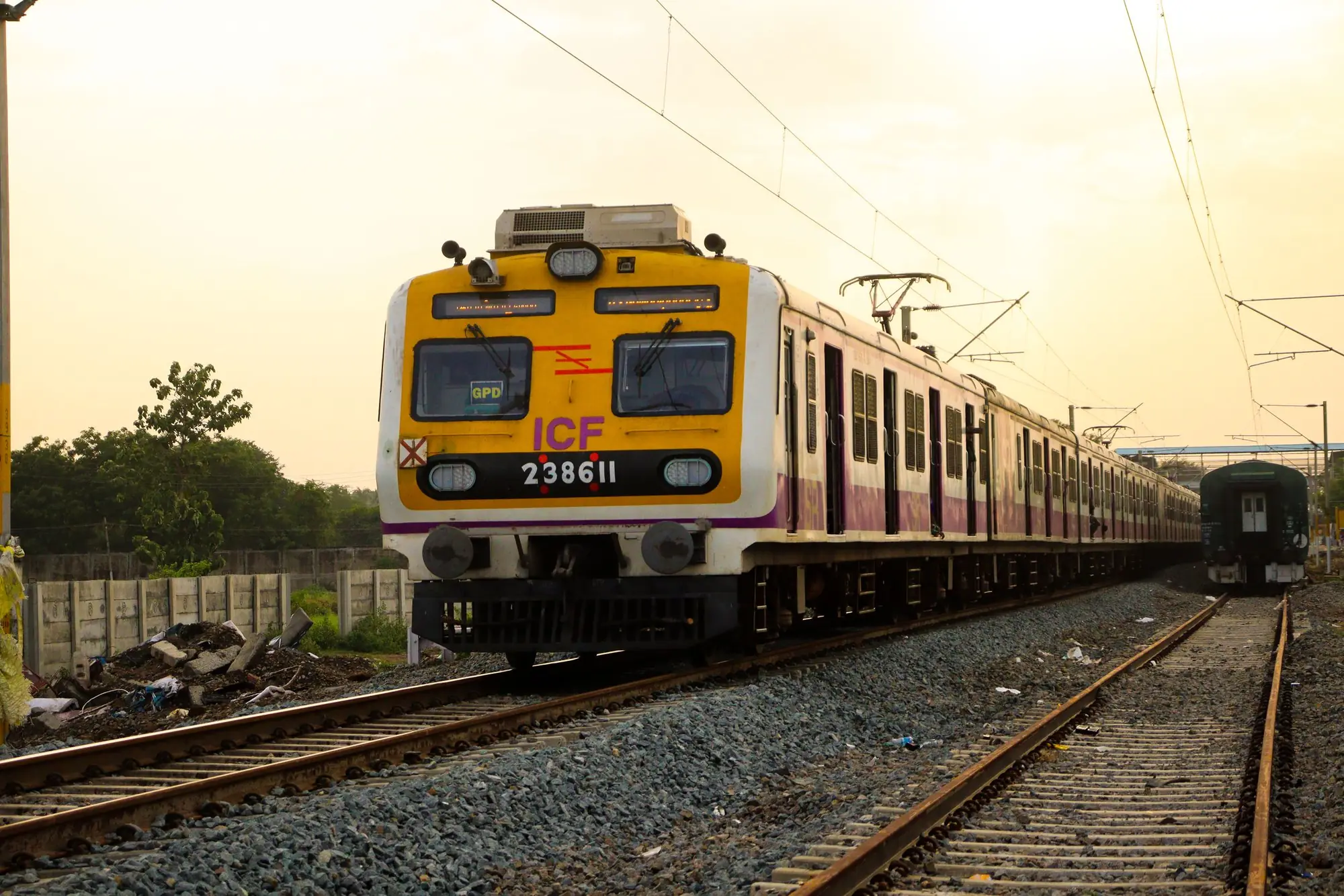 A Mumbai suburban train on its tracks at sunrise